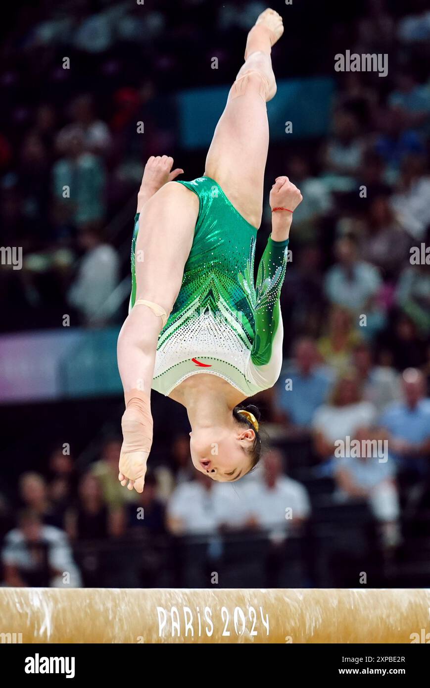 China's Zhou Yaqin performs during the women's balance beam final at