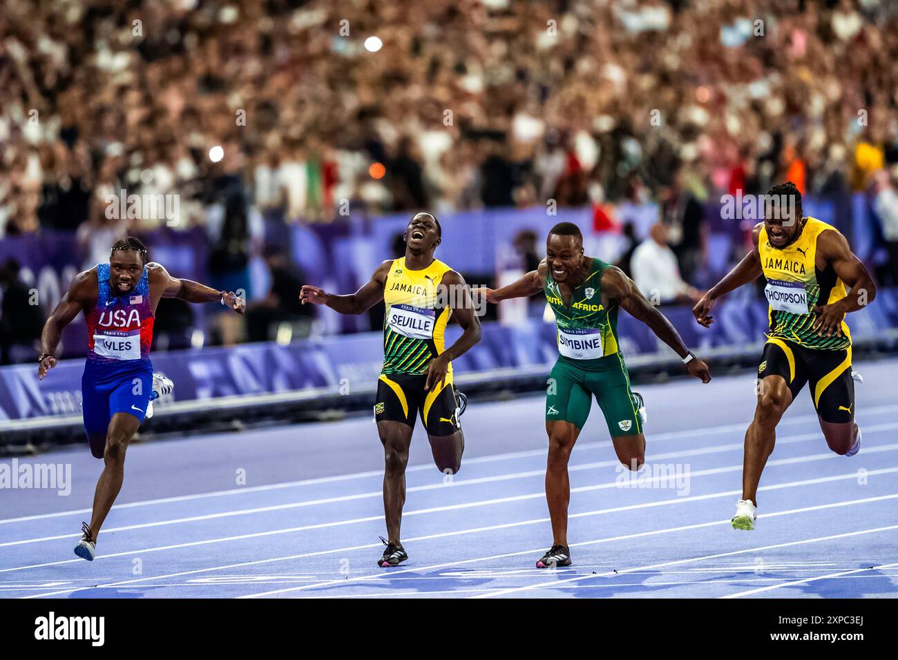 Noah Lyles (USA) wins the gold medal with Kishane Thompson (JAM) far
