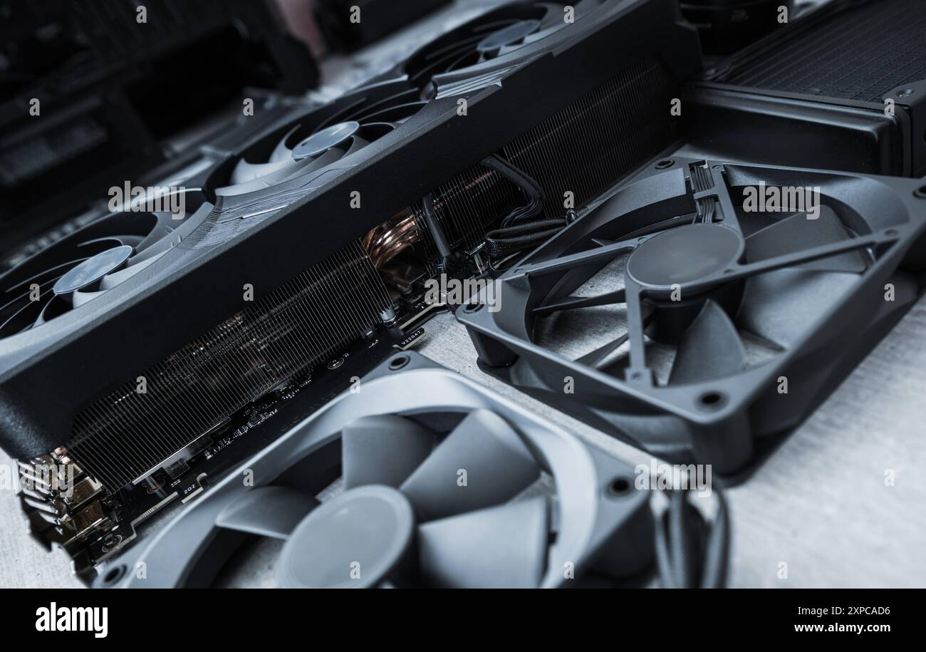 Various computer hardware parts, including graphic cards and cooling ...