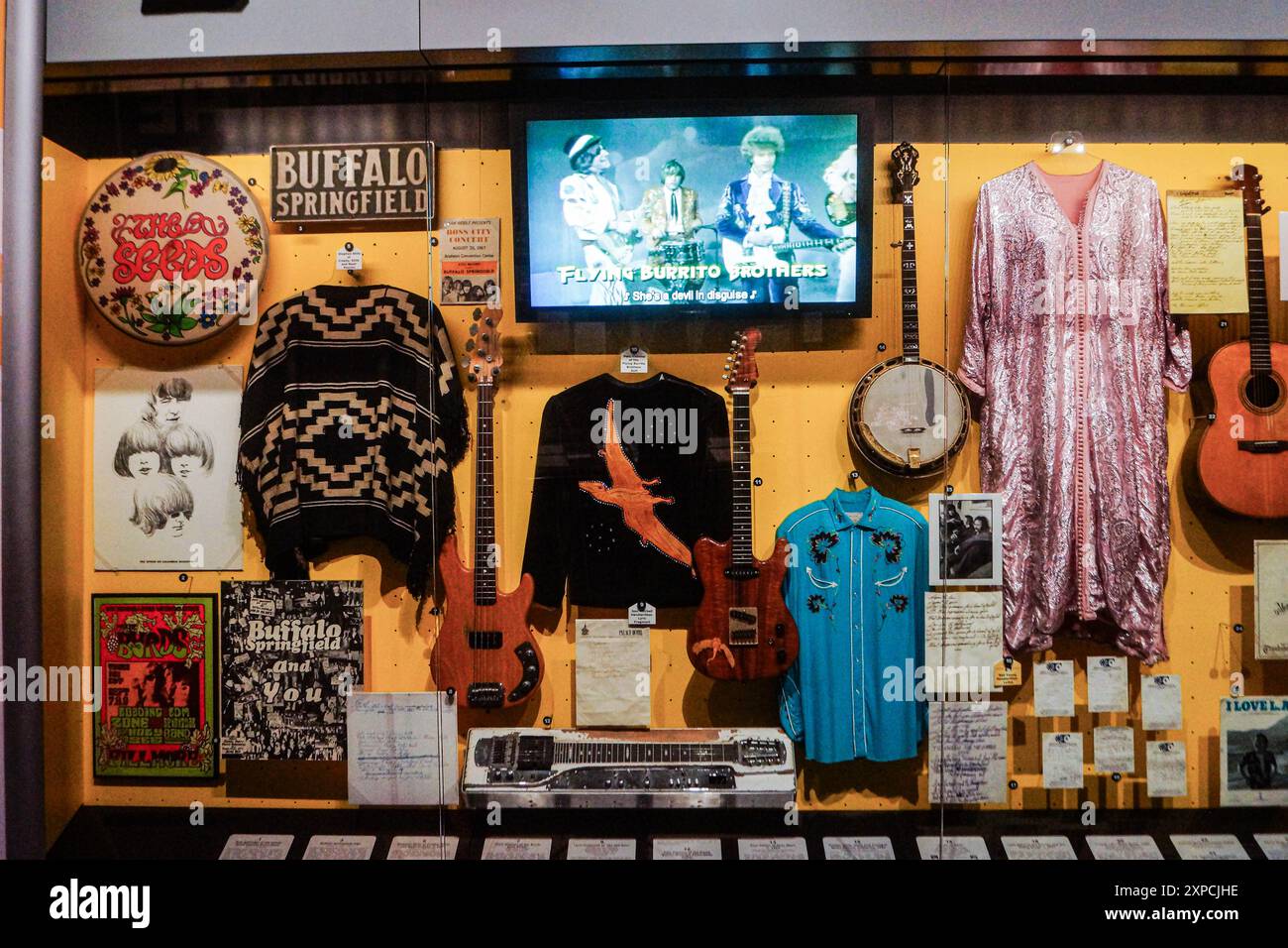 The museum showcase at music celebrity exhibits at Rock and Roll Hall of Fame, a famous museum in Cleveland, Ohio, with artists' dresses, guitars Stock Photo
