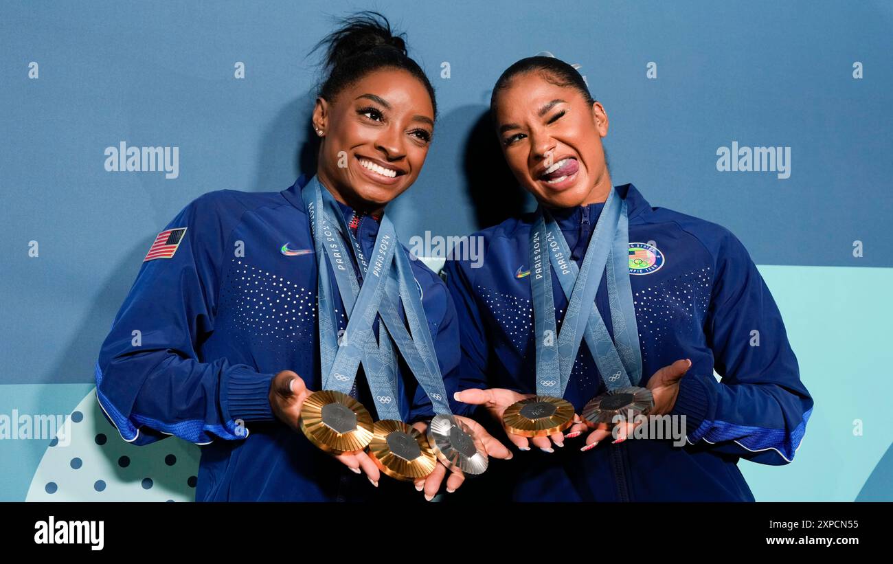 Jordan Chiles, of the United States, and Simone Biles, left, show off ...