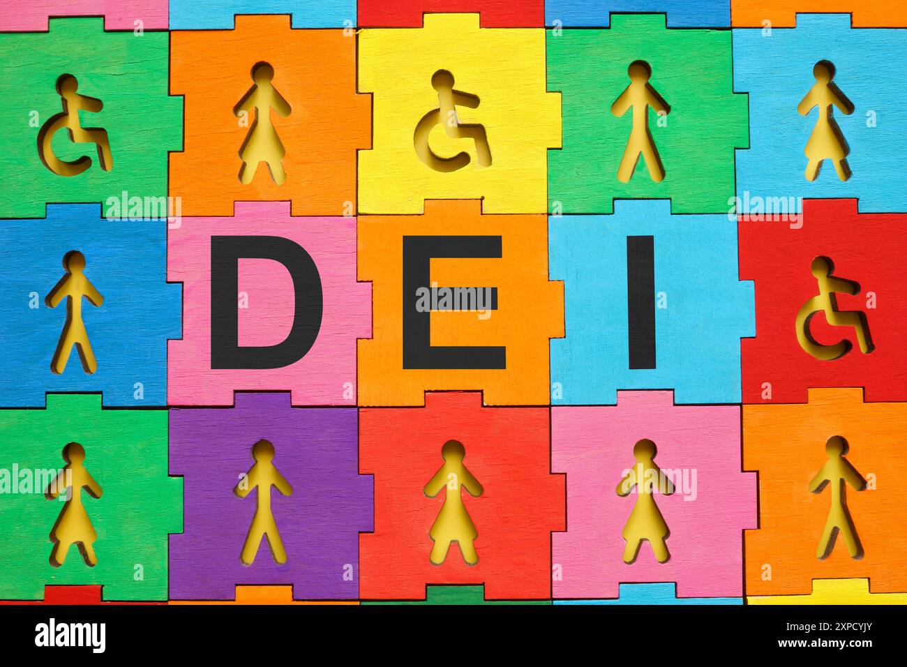 Multicolored puzzle with figures and abbreviation DEI diversity, equity ...