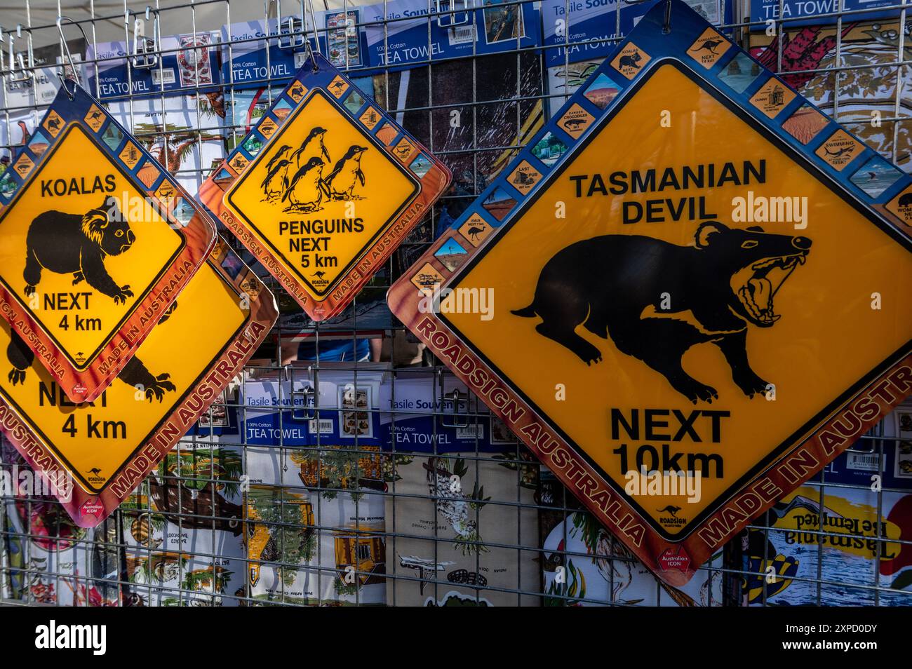 A display of tourist Australian wildlife road signs on sale at a weekly market held on a Saturday along Salamanca Place in Hobart, Tasmania, Australia Stock Photo