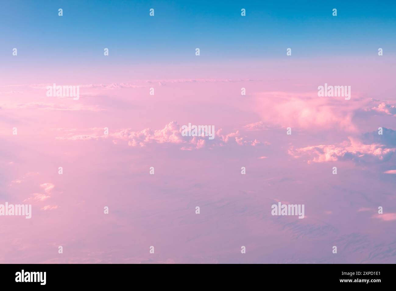 Airplane flying over pink clouds hi-res stock photography and images ...