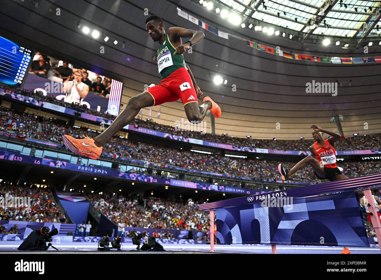 Paris, France. 5th Aug, 2024. Lamecha Girma (L) of Ethiopia competes