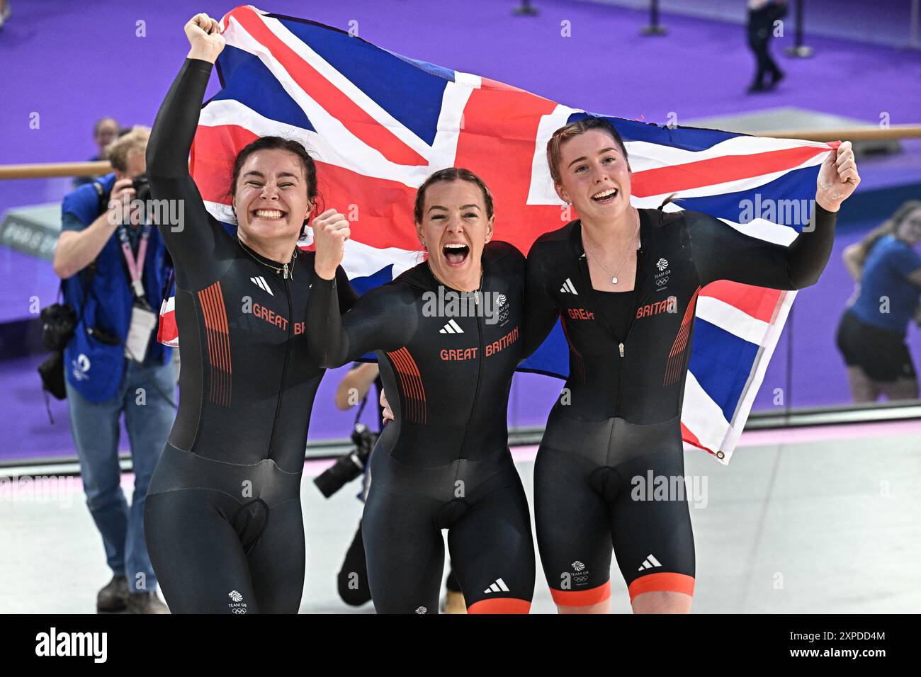 Saint Quentin En Yvelines, France. 05th Aug, 2024. Katy Marchant, Sophie Capewell and Emma Finucane of Team Great Britain celebrate their gold medal win during the Women's Team Sprint Track Cycling finals on day ten of the Paris 2024 Olympic Games at Saint-Quentin-en-Yvelines Velodrome in Saint-Quentin-en-Yvelines, near Paris, France on August 5, 2024. Photo by David Niviere/ABACAPRESS.COM Credit: Abaca Press/Alamy Live News Stock Photo