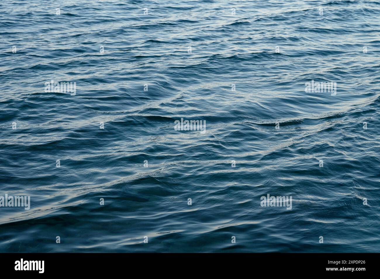 Blue ocean water with waves background Stock Photo - Alamy