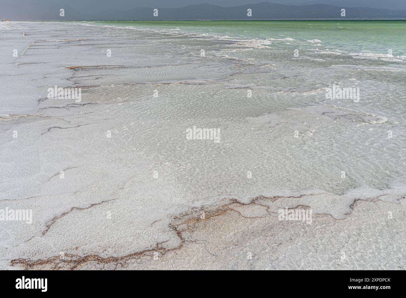 Lake Assal is the largest salt lake in Djibouti. It is a crater lake in the central part of Djibouti, located in the Afar Basin 155 m below sea level. Stock Photo