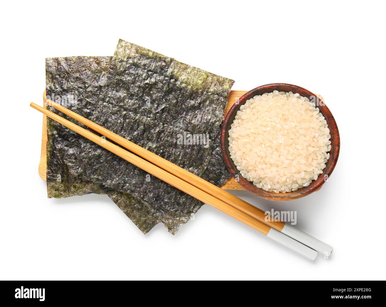 Noi Rice Wooden board with natural nori sheets and bowl of rice isolated on ...