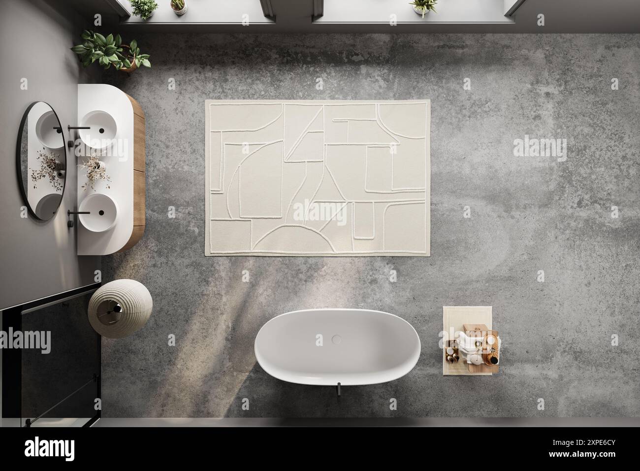 Top view of bathroom with a white rug and a white bathtub. The bathroom is clean and well-maintained Stock Photo
