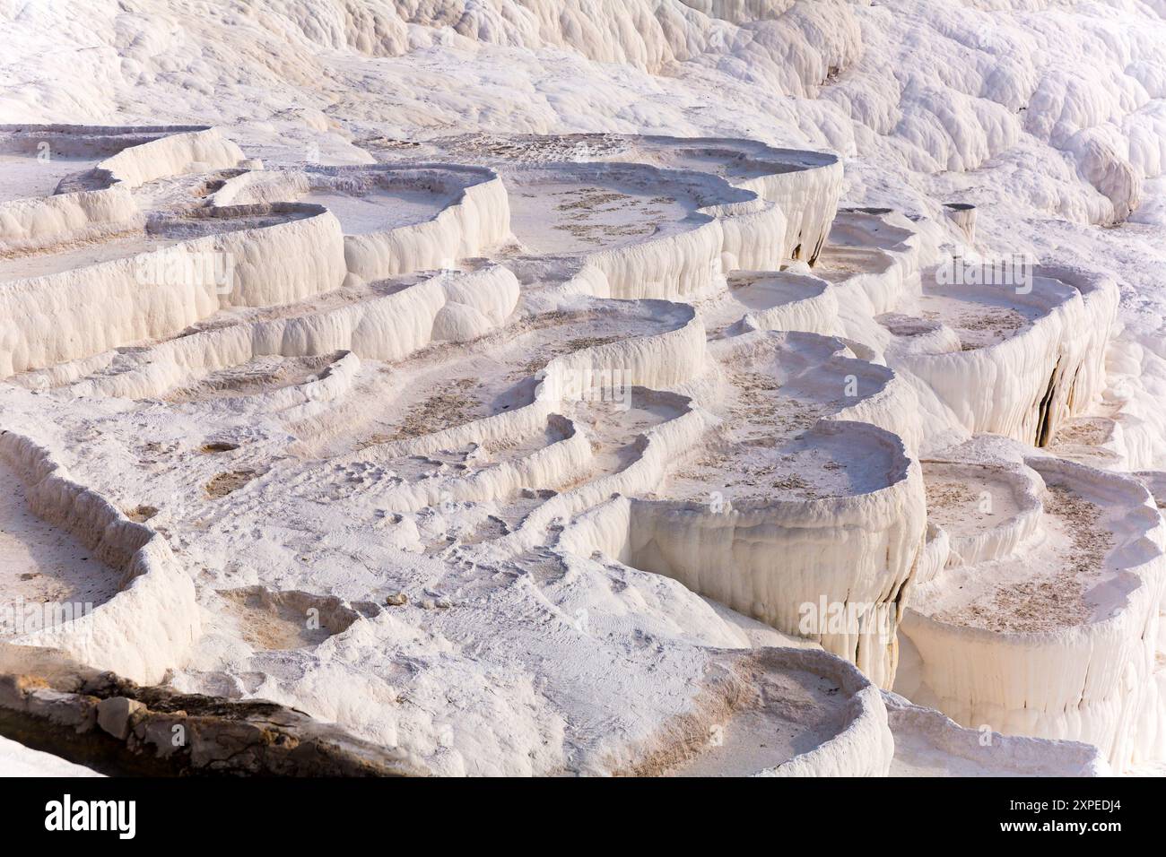 White travertine formations at hot springs of Pamukkale, Turkey Stock ...