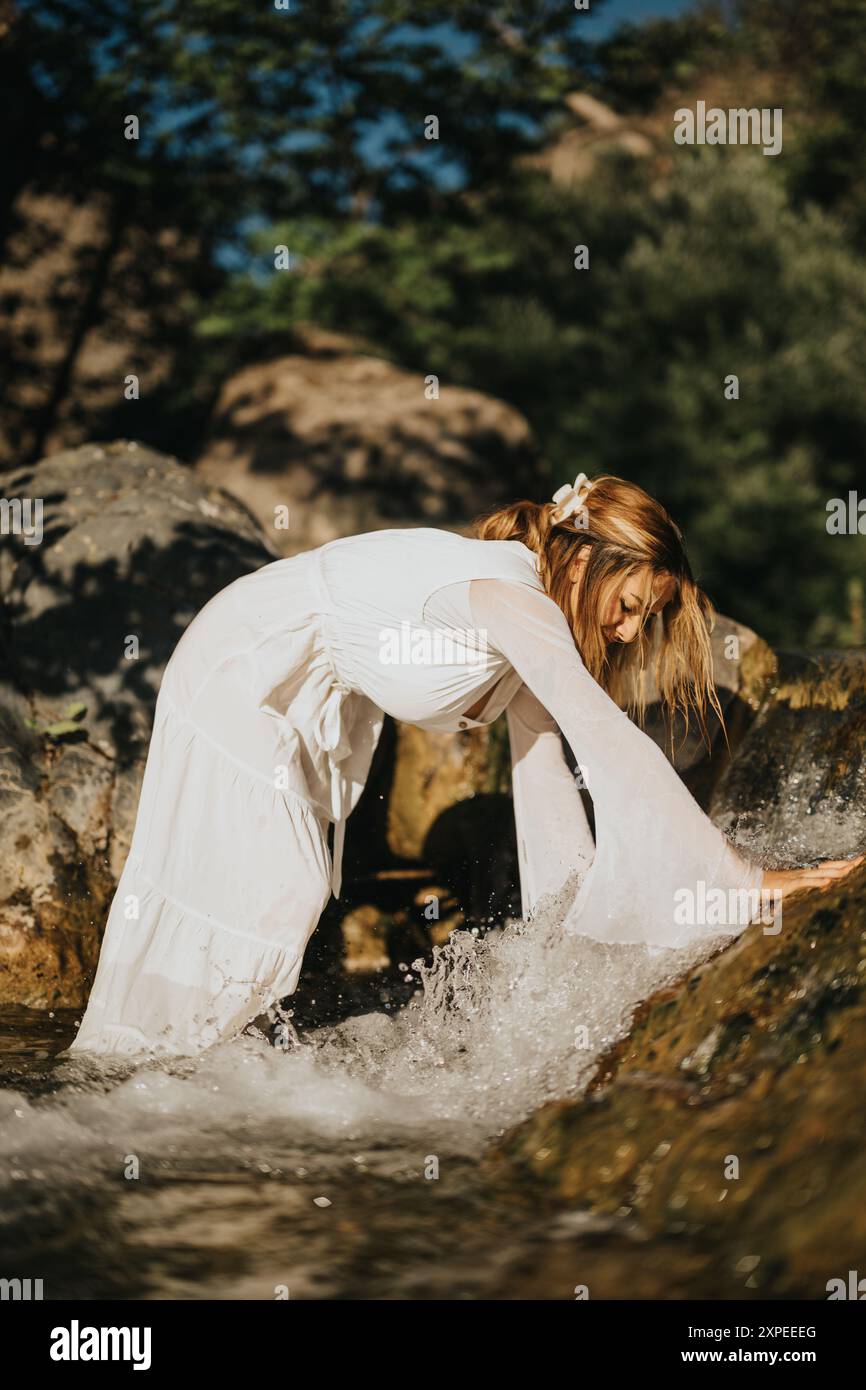 Beautiful woman bending over hi-res stock photography and images - Alamy