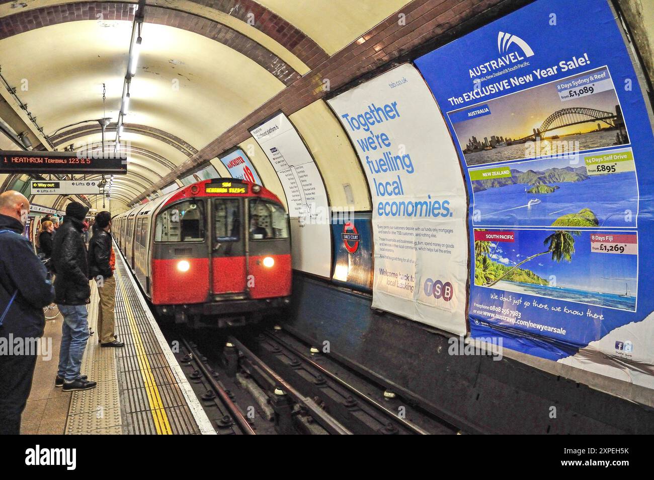 London Underground train approaching platform at Earl's Court Station on Piccadilly Line, Earl's Court, Greater London, England, United Kingdom Stock Photo