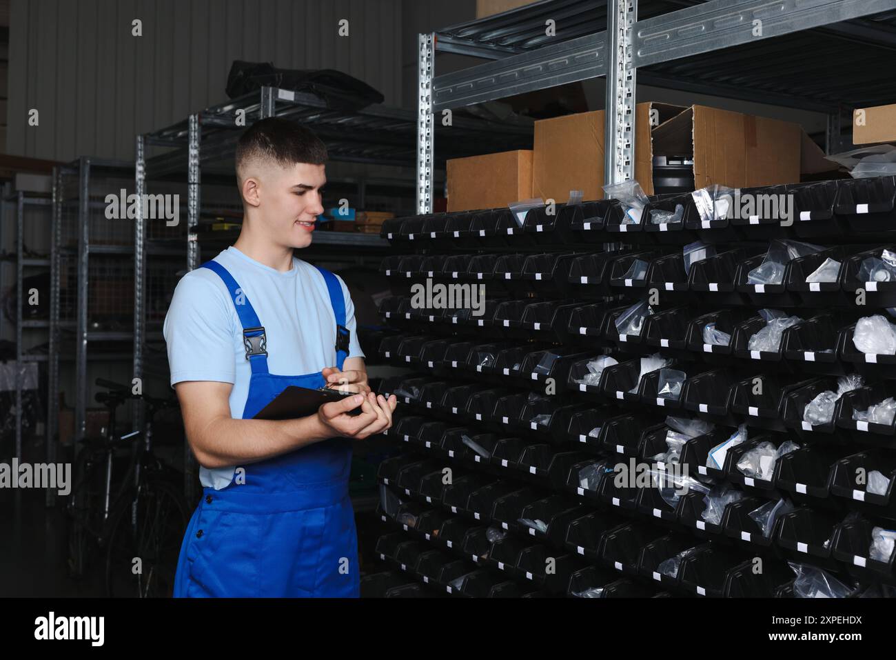 Young black man taking notes hi-res stock photography and images - Alamy