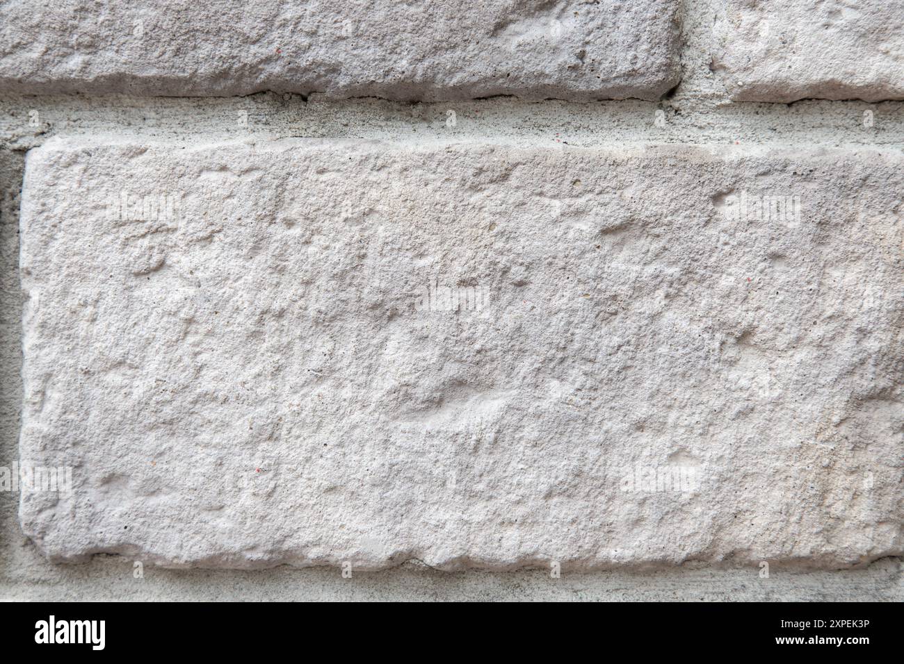 Gray gray brick wall close up background. Stock Photo