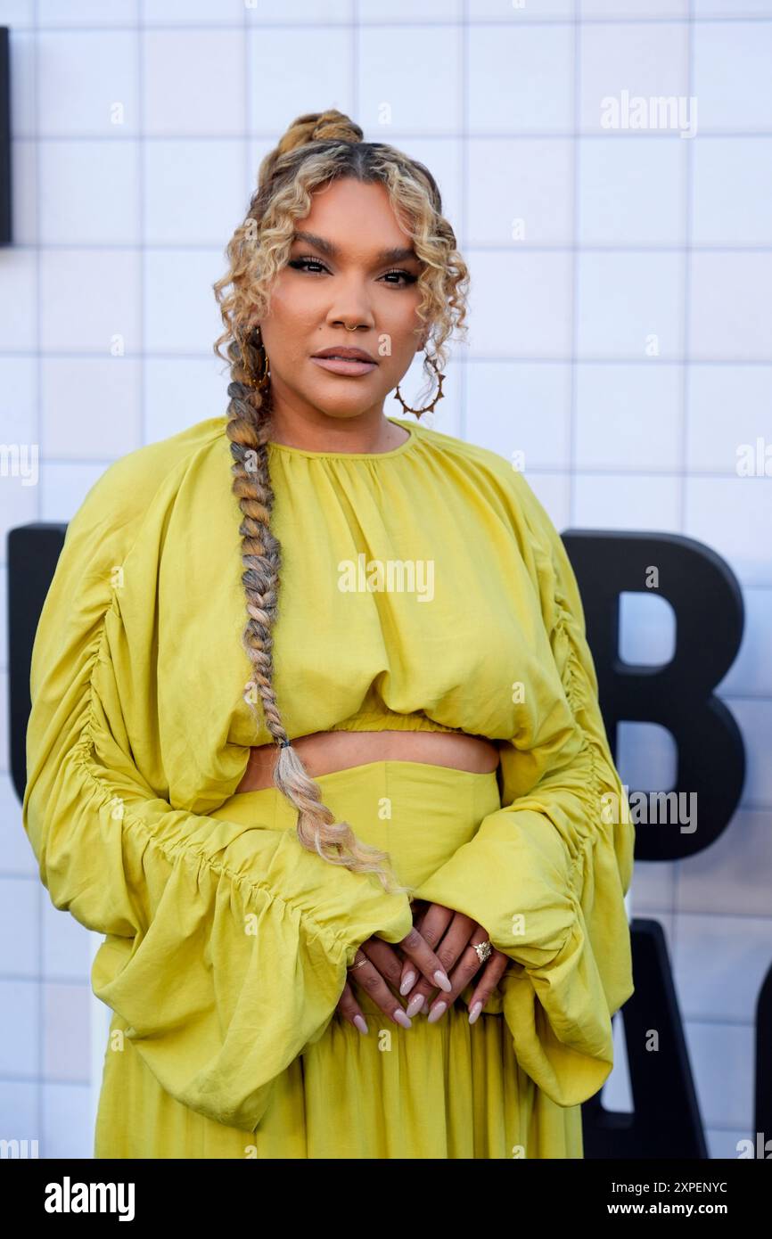 Emmy Raver Emmy Raver-Lampman arrives at the season four premiere of