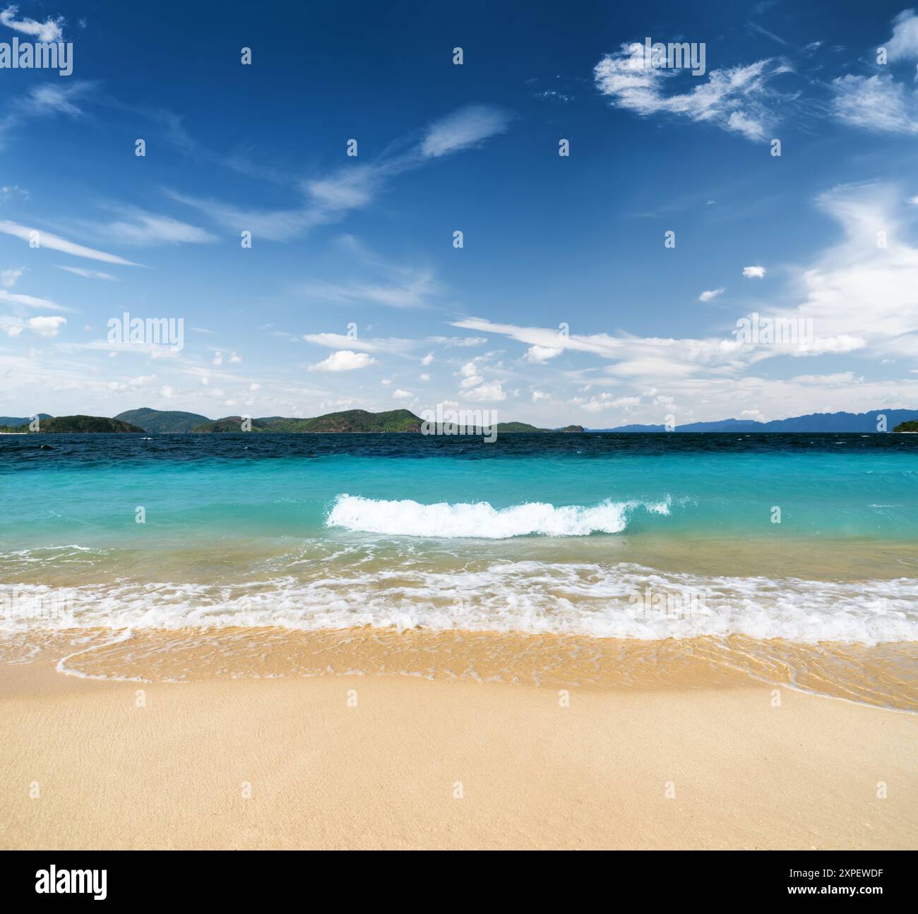 White sand beach and blue sky Stock Photo - Alamy