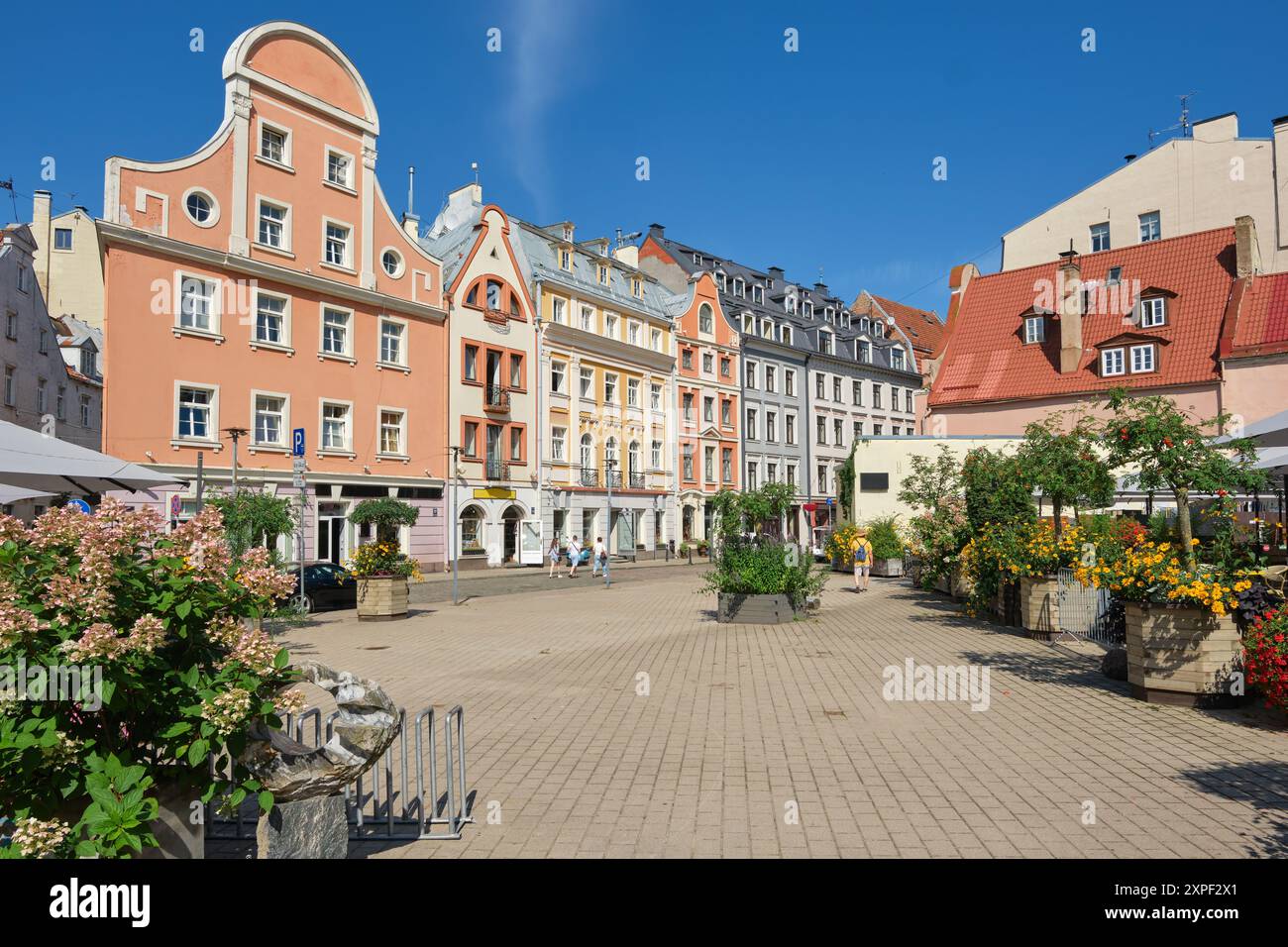 View of medieval street in old town of Riga. Old historical Tirgonu ...