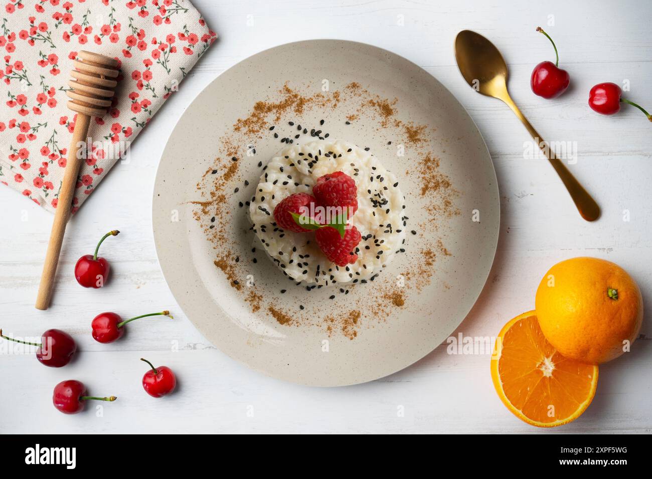 Delicious Thai sticky rice with fresh fruit on a table with Christmas decoration. Stock Photo