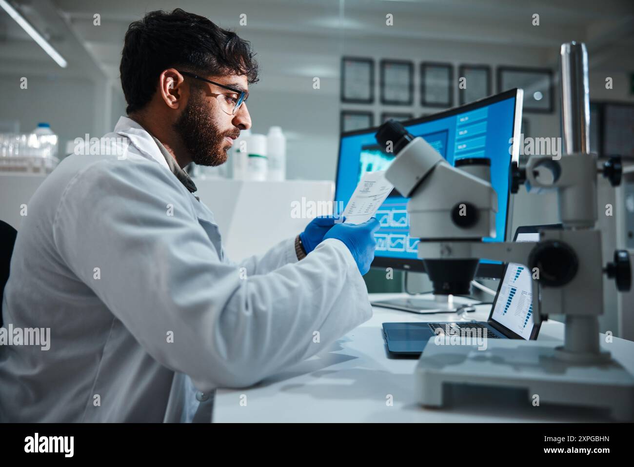 Computer screen, paper and science with man in laboratory for ...