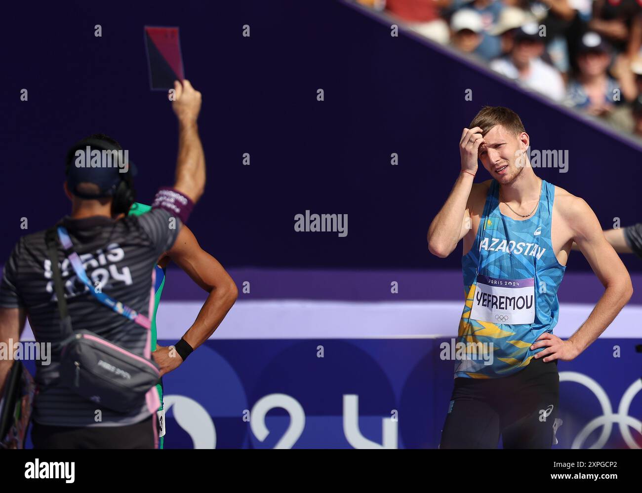 Paris, France. 6th Aug, 2024. David Yefremov (R) of Kazakhstan reacts after being disqualified for a false start during the men's 110m hurdles repechage round of Athletics at the Paris 2024 Olympic Games in Paris, France, Aug. 6, 2024. Credit: Li Ming/Xinhua/Alamy Live News Stock Photo