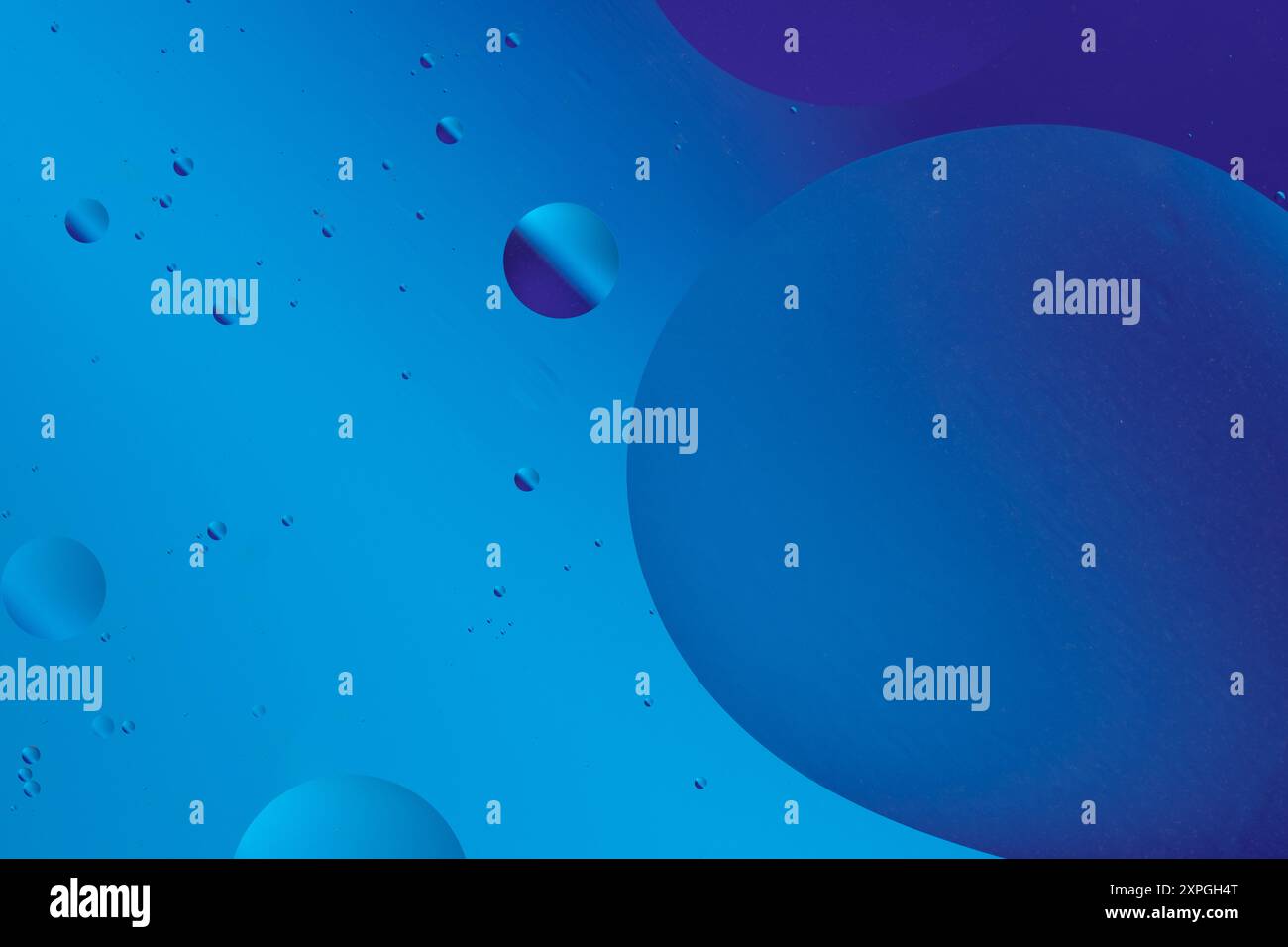 Abstract blue bubbles and shapes flow together, creating a tranquil ...