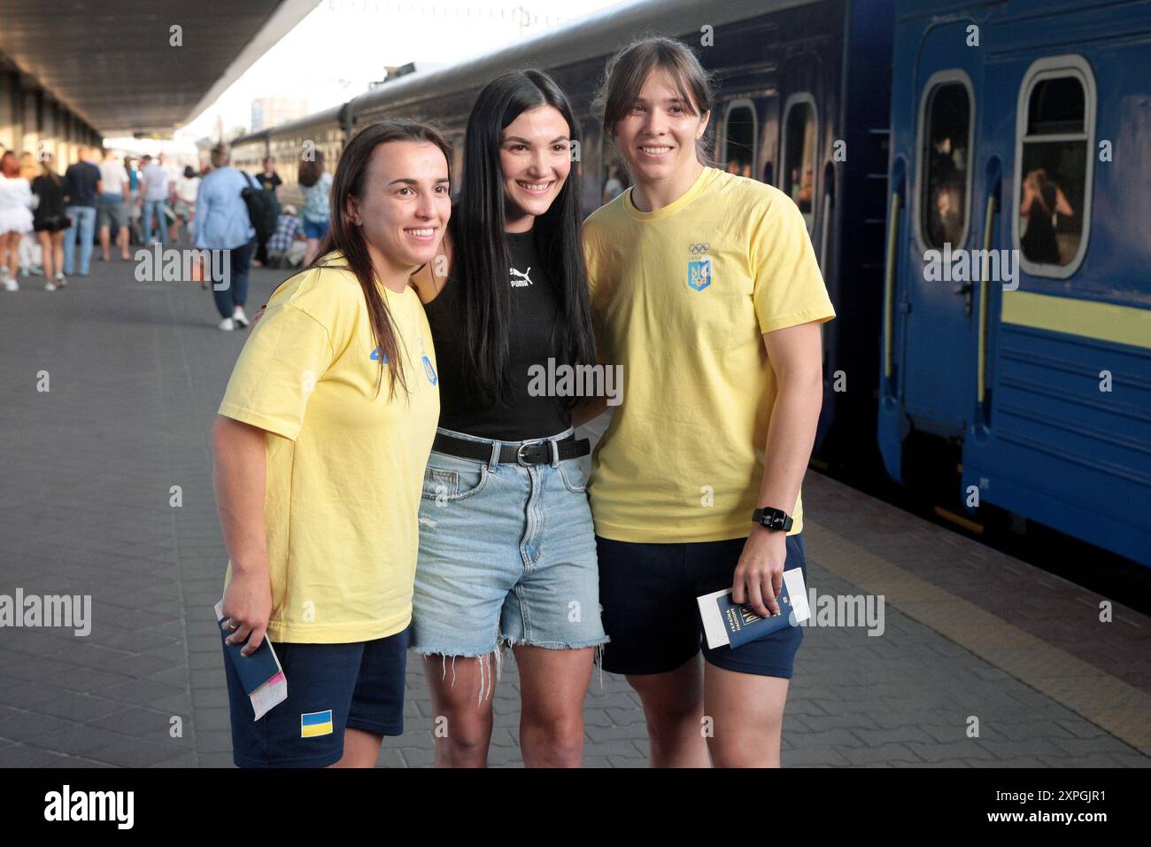 KYIV, UKRAINE - AUGUST 2, 2024 - Ukrainian freestyle wrestlers Tetiana Sova (R) and Oksana Livach pose for a photo on the platform during the ceremony to see the national women’s wrestling squad off to the Paris 2024 Olympic Games at the Kyiv-Pasazhyrskyi railway station, Kyiv, capital of Ukraine. Stock Photo