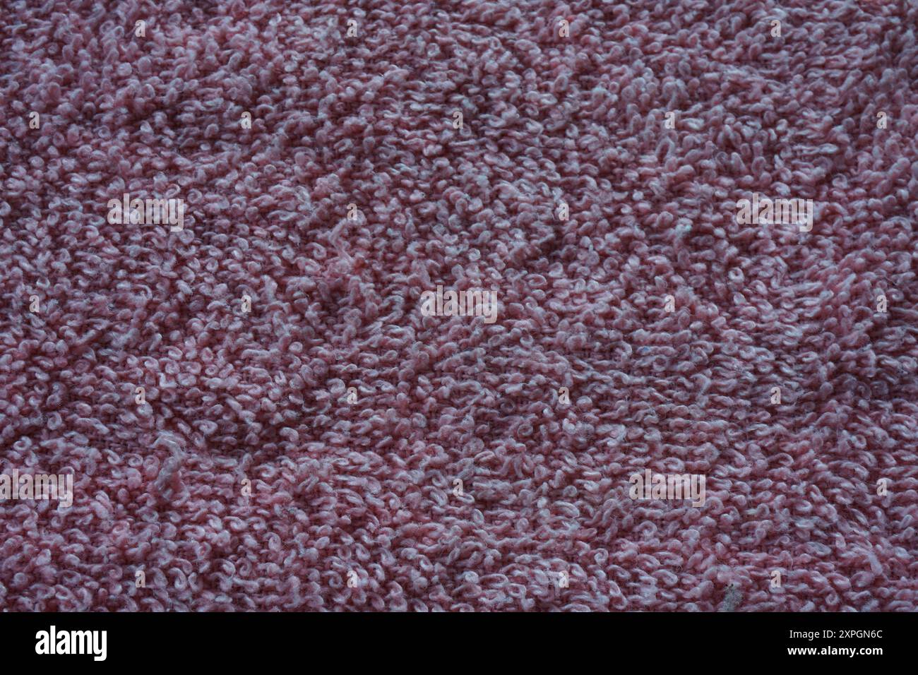 Closeup of red fabric texture. Smooth surface texture. Stock Photo