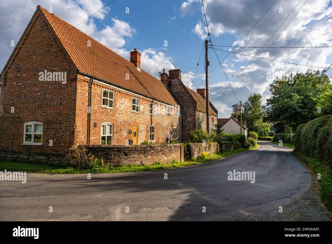House and main street in the village of Suffield, north Norfolk Stock Photo