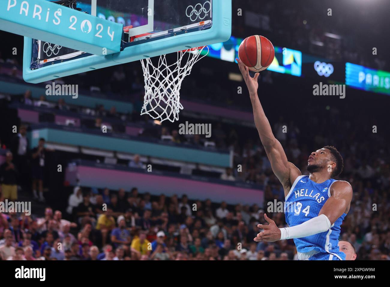 Paris, France. 06th Aug, 2024. Greece small forward Giannis Antetokounmpo (34) lay up the ball in the MenÕs Basketball Quarter Finals between Germany and Greece during the 2024 Olympics from Paris, France on 6 August 2024. Photo by Peter Dovgan. Editorial use only, license required for commercial use. No use in betting, games or a single club/league/player publications. Credit: UK Sports Pics Ltd/Alamy Live News Stock Photo