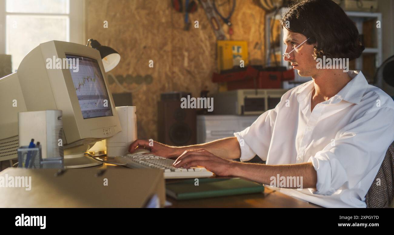 Caucasian Male Stock Trader Using Old Desktop Computer With Financial ...