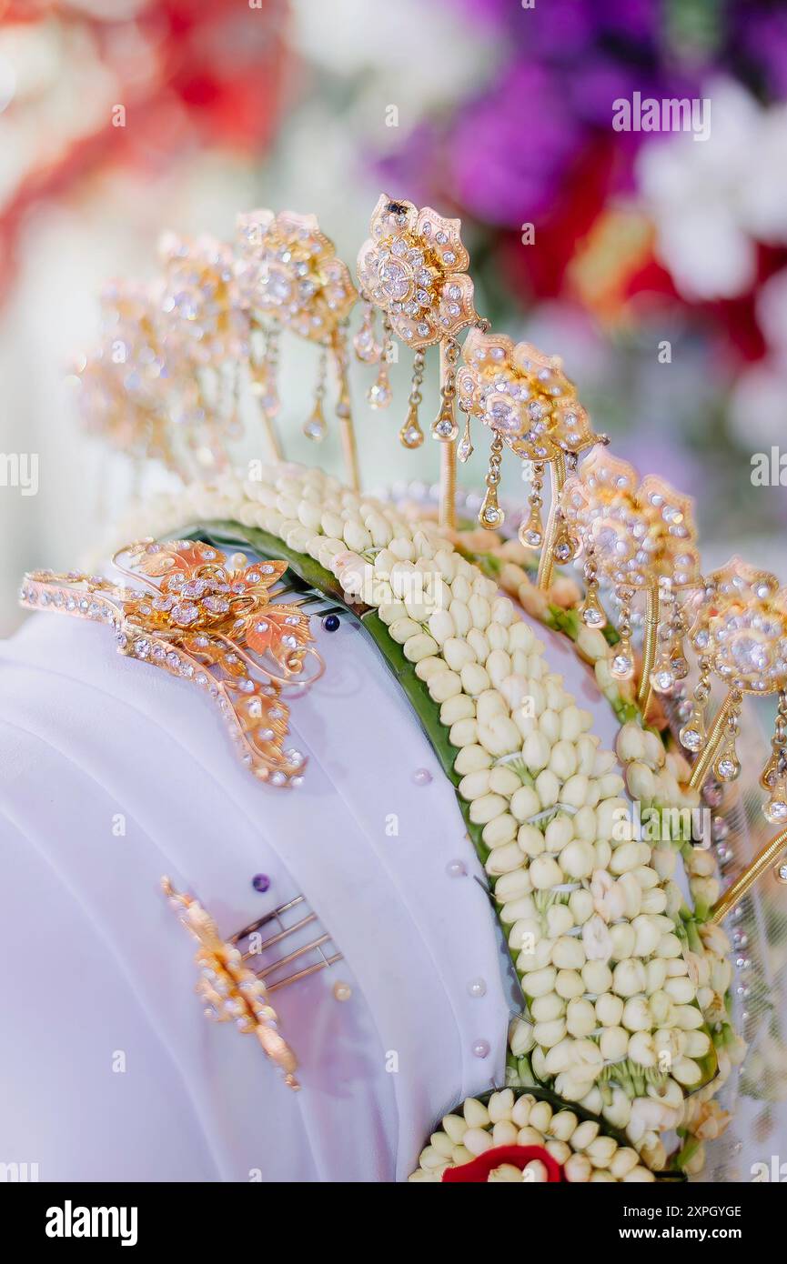 Image showcasing a Javanese bride with intricate braids incorporated into her hairstyle, perhaps flowing into a bun or cascading down her back.