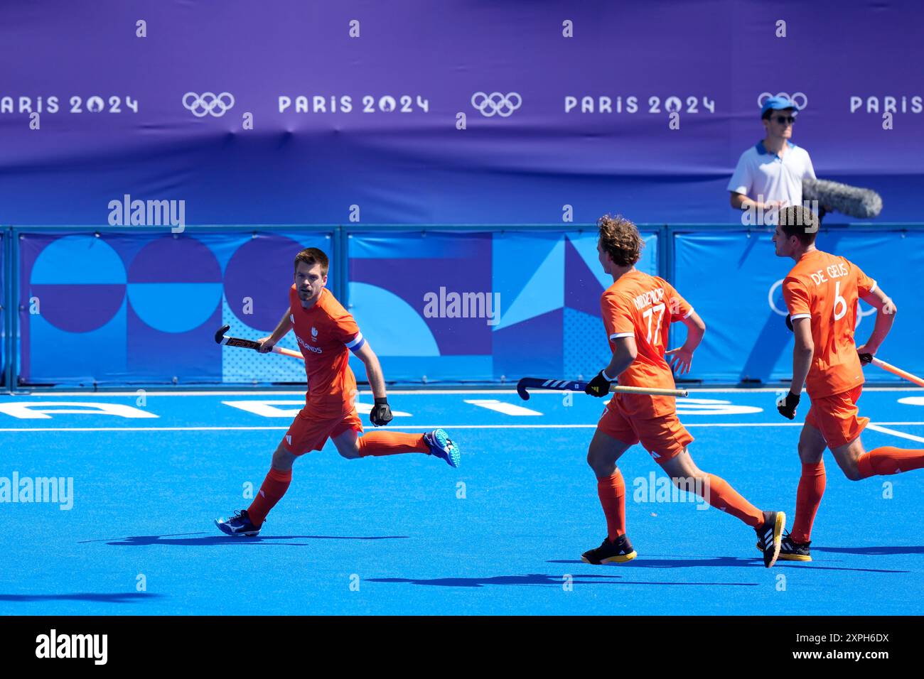 Netherlands' Thierry Brinkman, left, celebrates after scoring his side ...