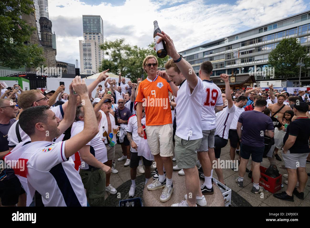 England football fans conregating at Zoologischer Garten ahead of the EURO24 final against Spain in Berlin, Germany Stock Photo