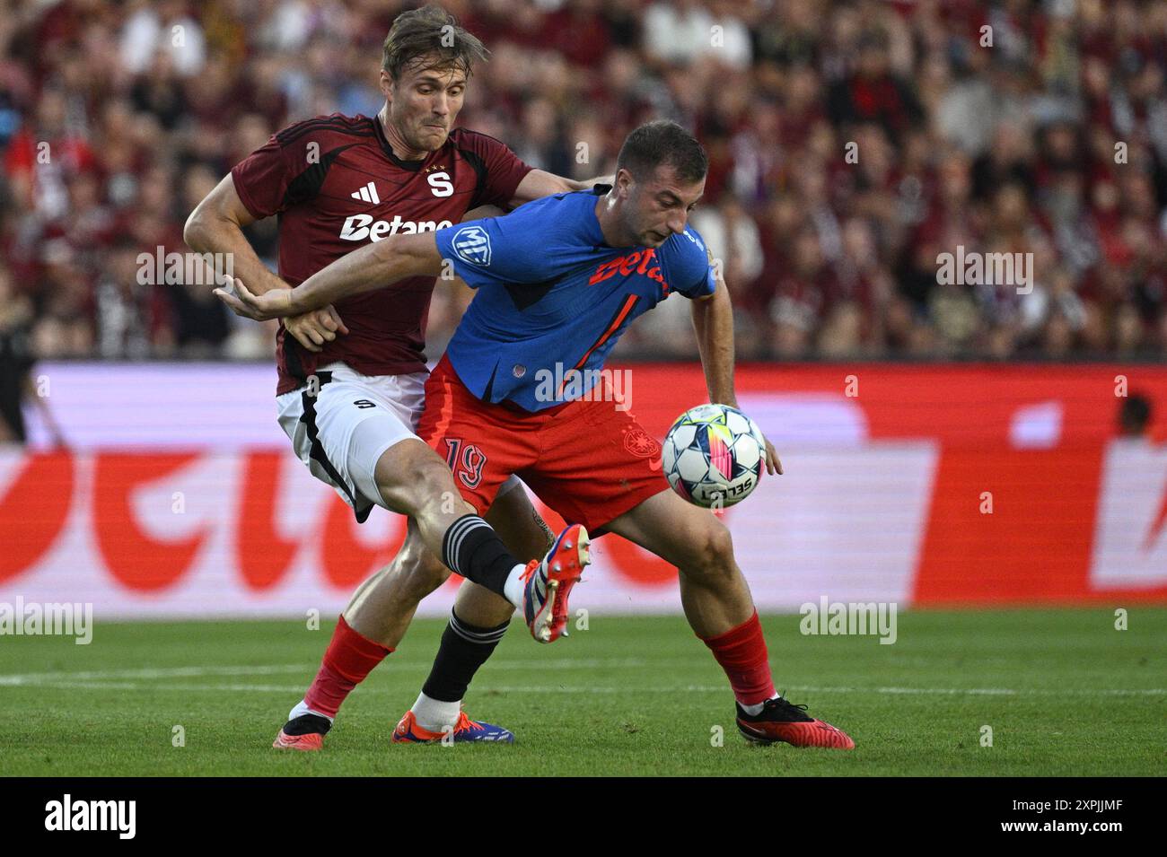 Prague, Czech Republic. 06th Aug, 2024. Daniel Popa of FCSB, right, in action during the first leg of 3rd qualifying round match of football Champions League Sparta Praha vs FCSB (Romania) in Prague, Czech Republic, August 6, 2024. Credit: Michal Kamaryt/CTK Photo/Alamy Live News Stock Photo