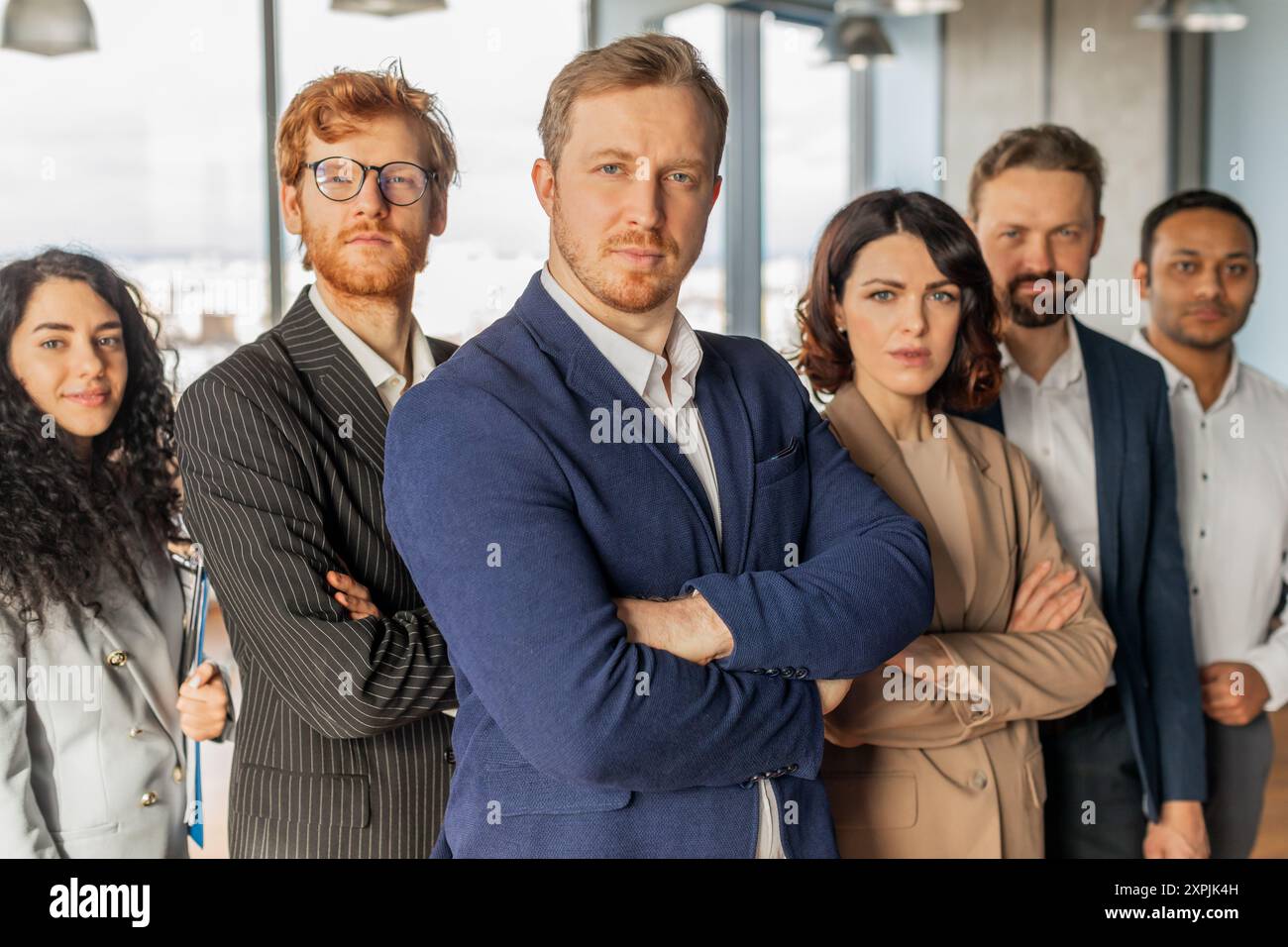Confident Business Team Standing Together in a Modern Office Stock ...