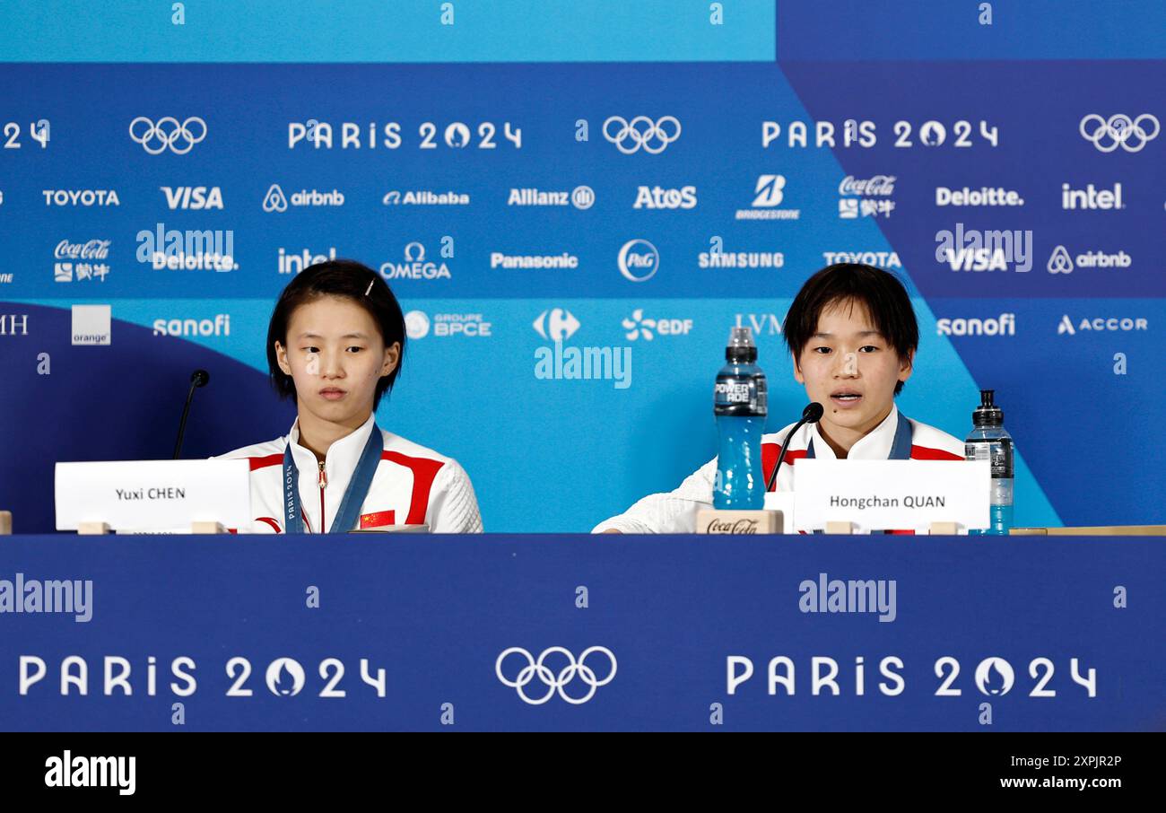 Saint Denis. 6th Aug, 2024. Gold medalist Quan Hongchan (R) and silver ...