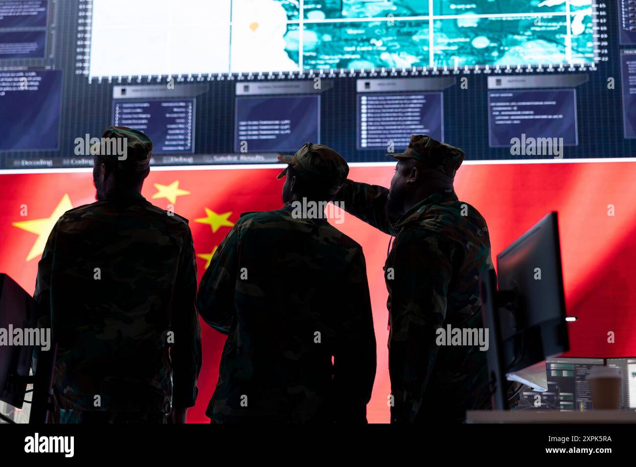 Soldiers team in a Chinese military control center reviews tactical ...