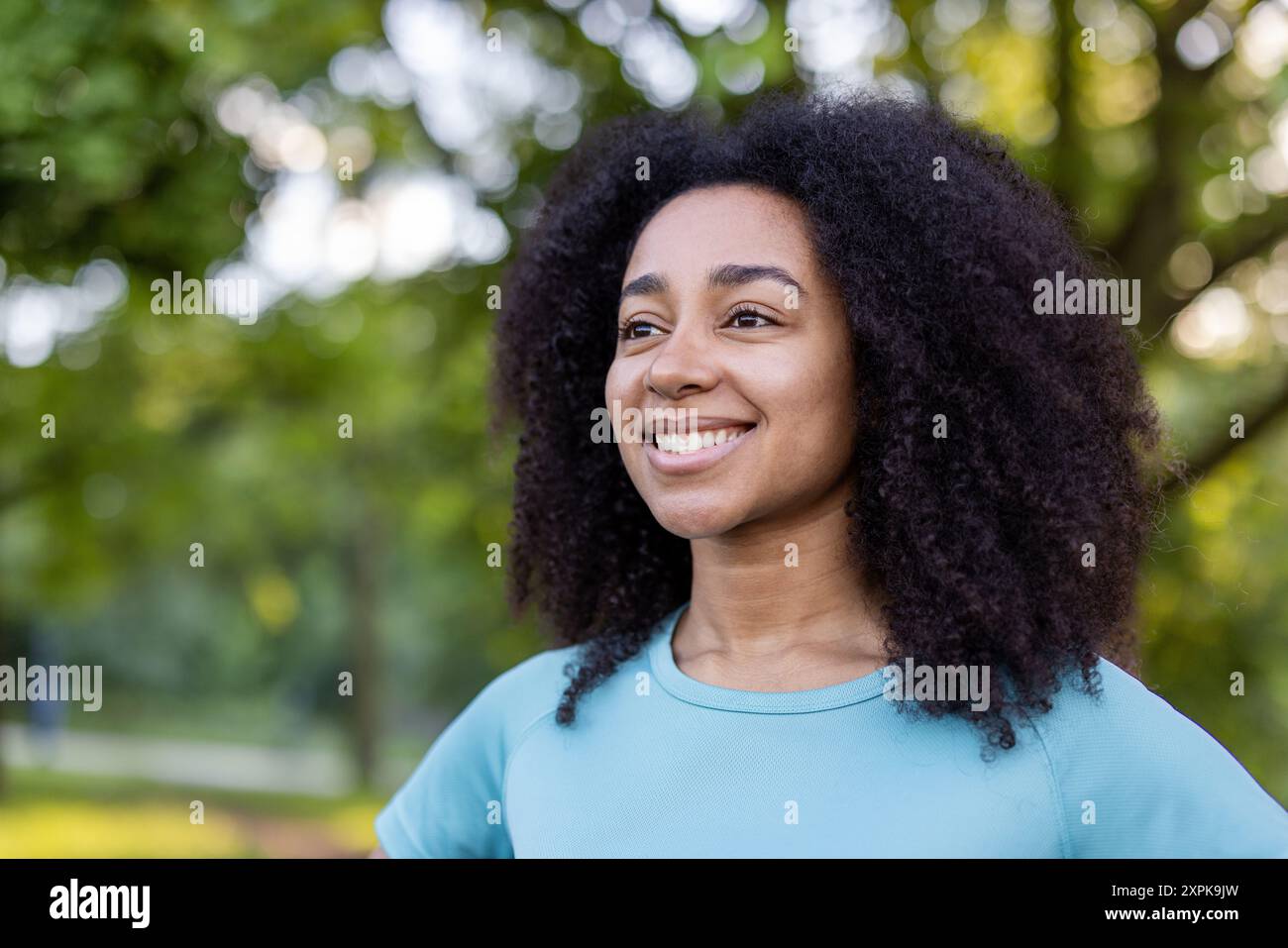 Relaxed african american woman lighting hi-res stock photography and ...