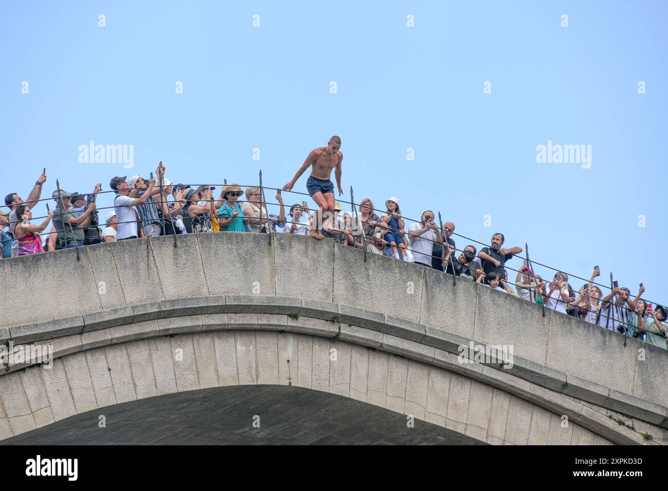 Daredevil diver jumping off the Stari Most (Old Bridge). Mostar. Bosnia and Herzegovina Stock Photo