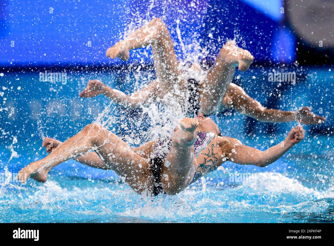 Athletes of team China compete in the artistic swimming Team Free ...