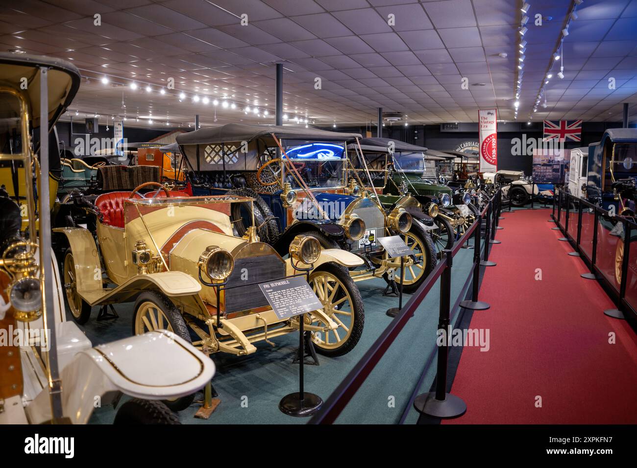 Car And Carriage Caravan Museum Vintage Cars Luray Virginia // LURAY, Virginia, United States — A diverse collection of vintage cars on display at the Car and Carriage Caravan Museum in Luray, Virginia. The exhibit showcases the evolution of automotive design and technology, featuring well-preserved vehicles from the early 20th century to more recent classics, offering visitors a journey through automotive history. Stock Photo