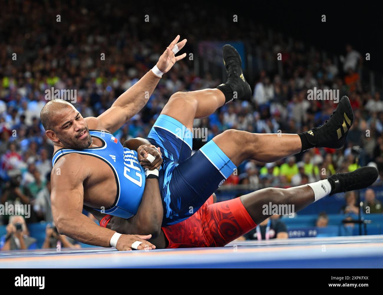 Paris, France. 6th Aug, 2024. Yasmani Acosta Fernandez (front) of 