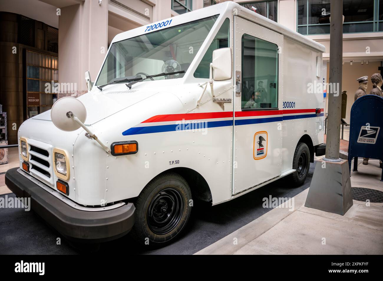 WASHINGTON, DC, United States — A US Postal Service Flexible Fuel Vehicle (FFV) on display at the Smithsonian National Postal Museum in Washington, DC. This modern postal delivery vehicle, manufactured by Ford Motor Company, can run on 85% ethanol fuel, gasoline, or any combination of the two. It represents the Postal Service's efforts to improve delivery efficiency while reducing reliance on fossil fuels in the 21st century. Stock Photo