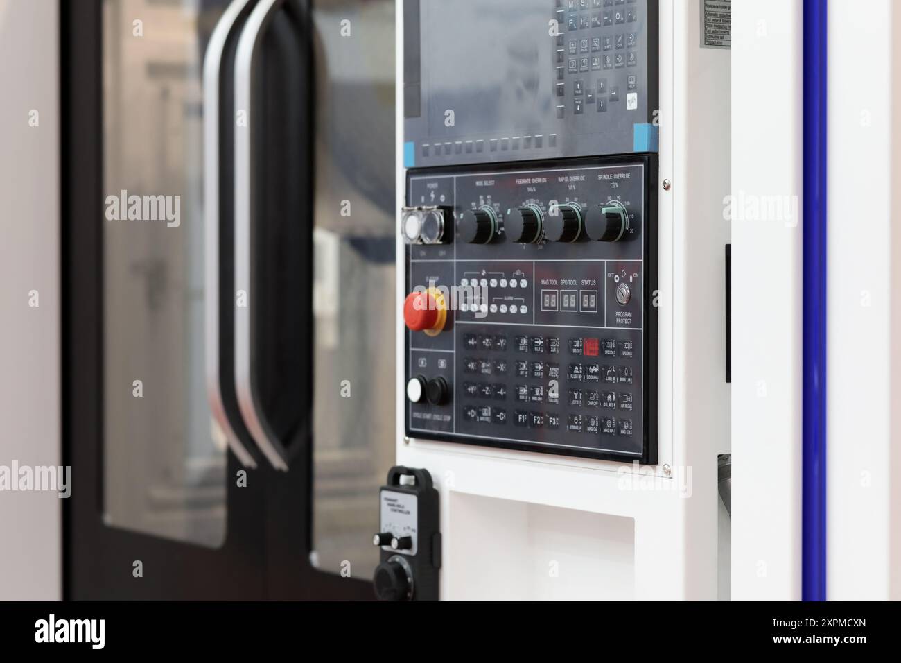 Modern industrial metalworking CNC machine closeup. Selective focus. Stock Photo