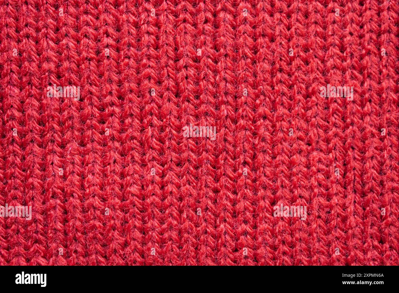 Red knitted wool fabric texture background Stock Photo - Alamy