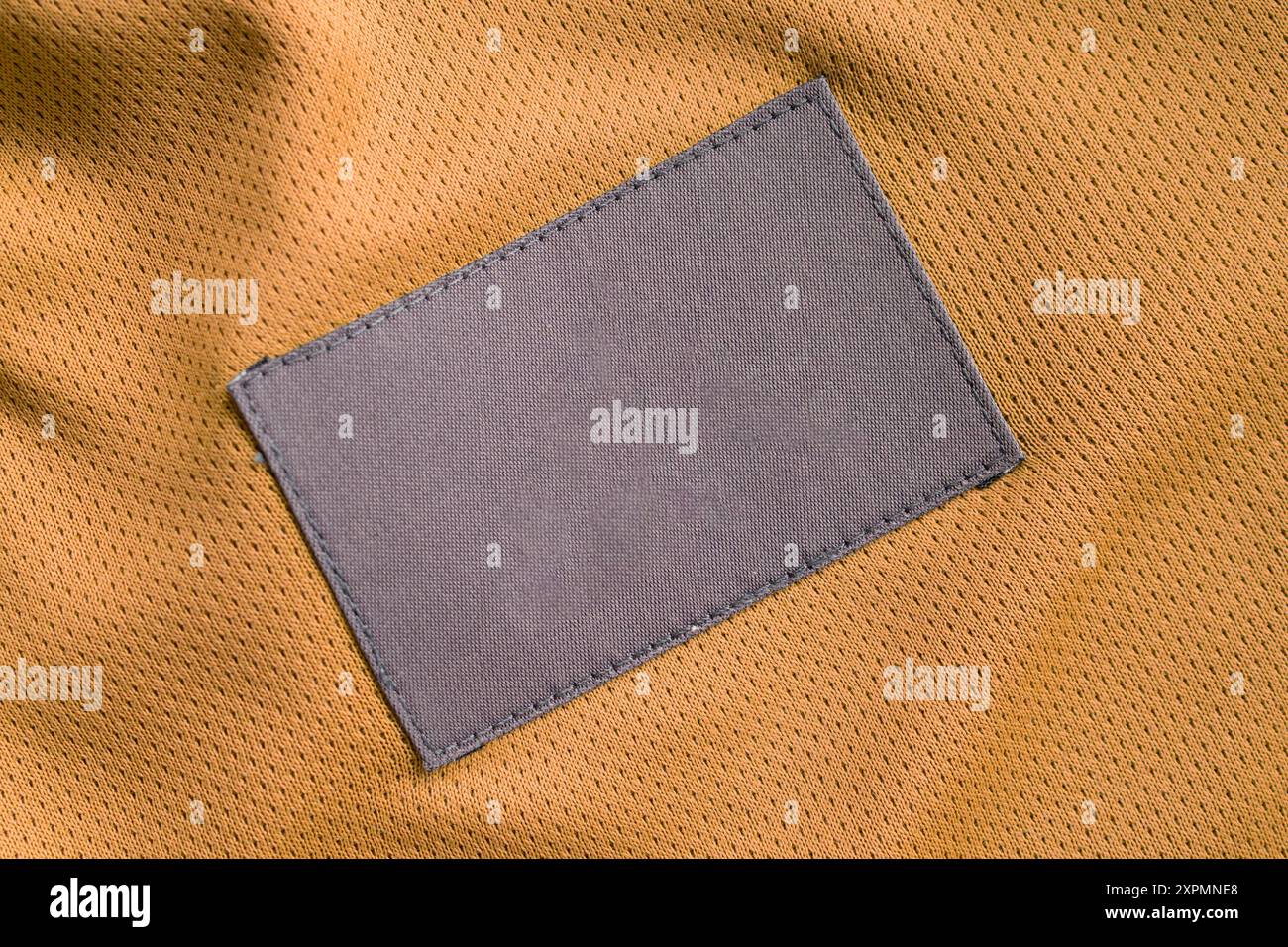 laundry care clothing label patch on polyester fabric jersey sport ...