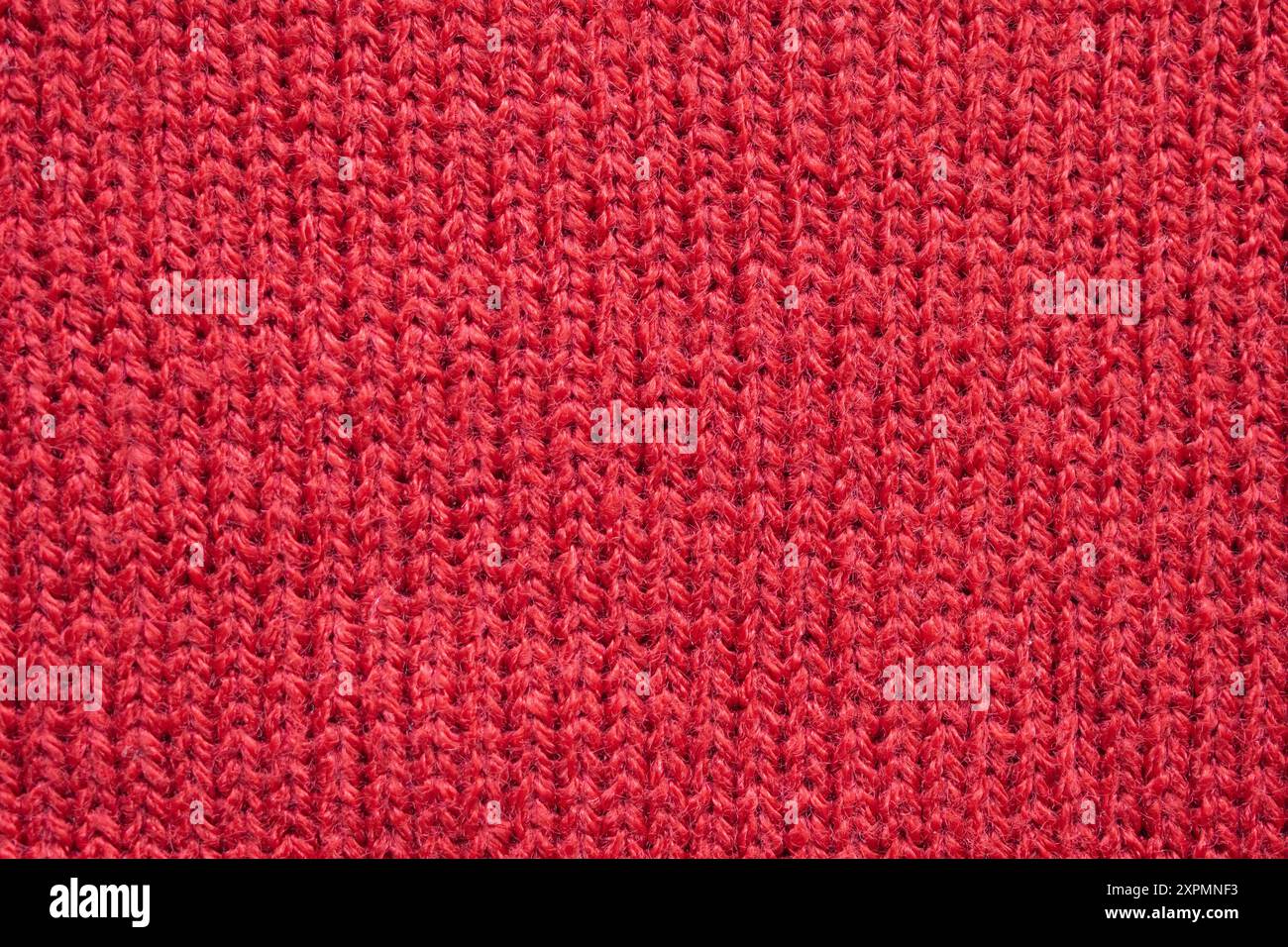 Red knitted wool fabric texture background Stock Photo - Alamy