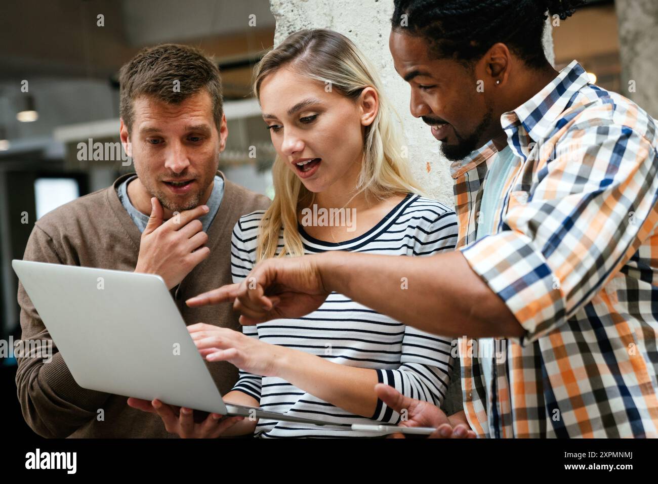 Programmers working in a software developing company office Stock Photo