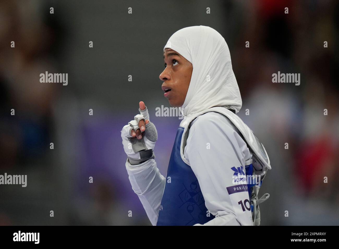 Saudi Arabia's Dunya Ali M Abutaleb stands as she competes with Israel